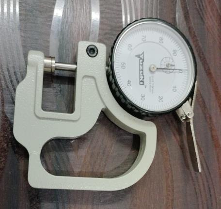Thickness checker